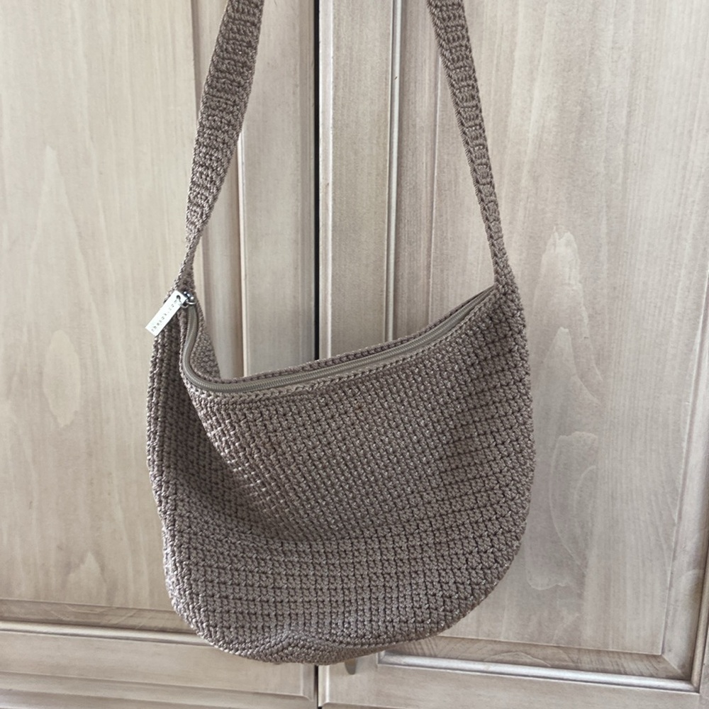 The Sak shoulder bag euc taupe hobo style round base